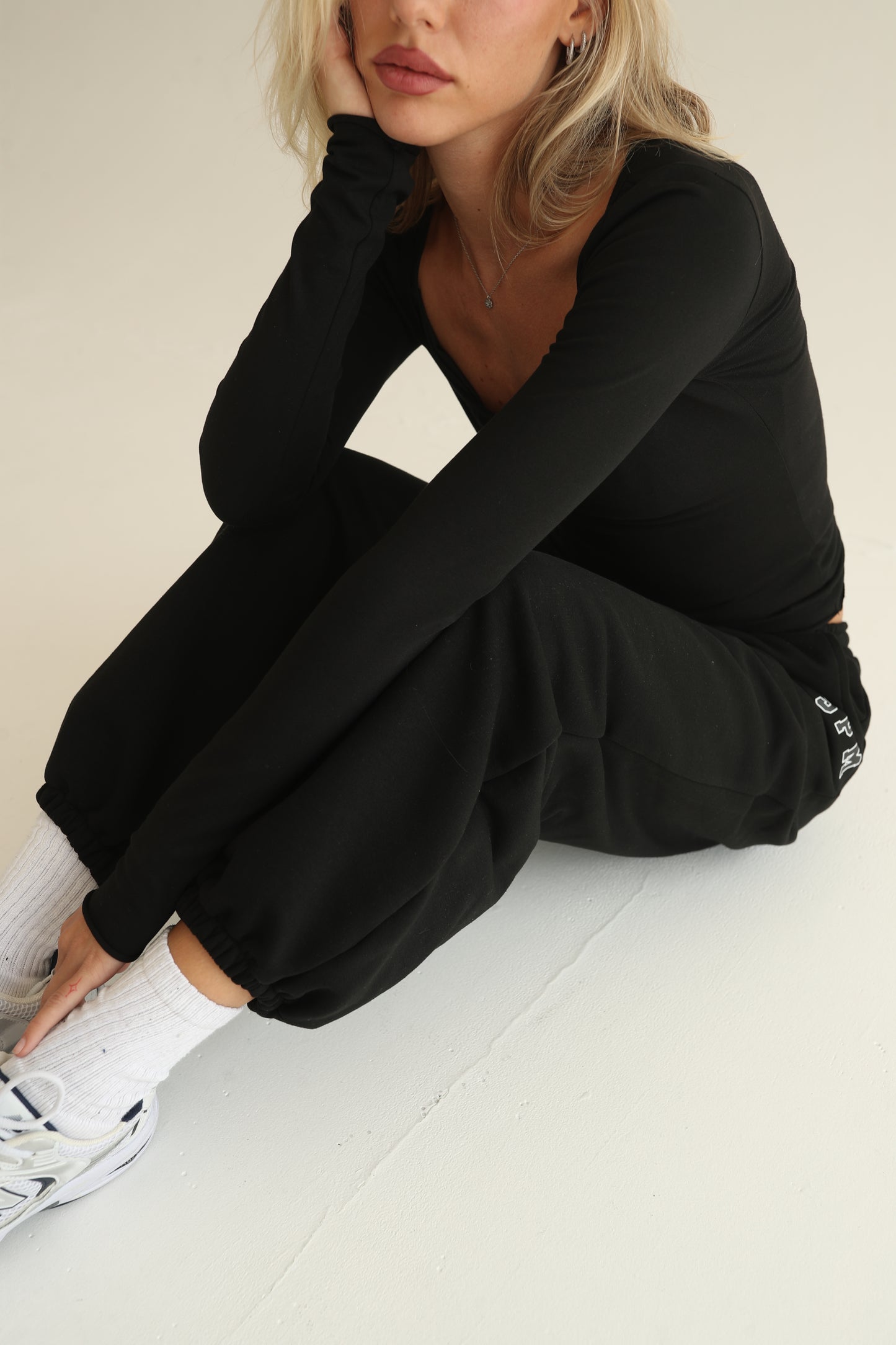 Black sweatshirts with rubber bottom