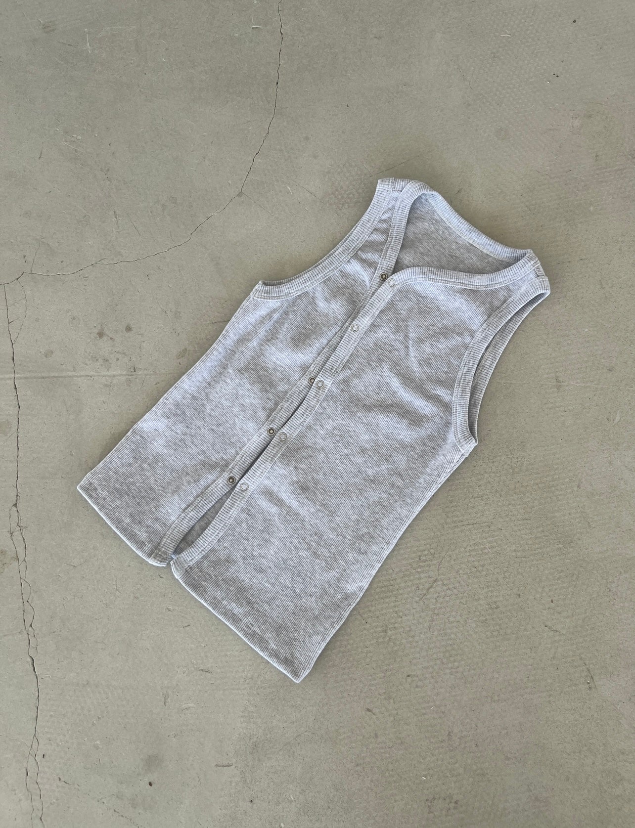 Light gray tank top with buttons