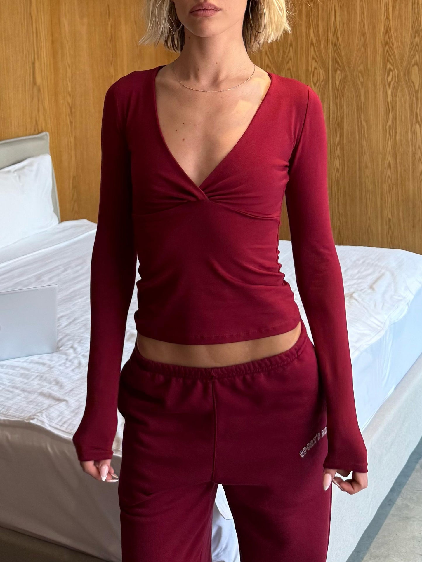 Burgundy V crossed top