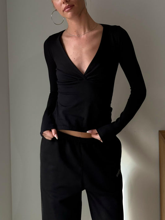 Black V crossed top