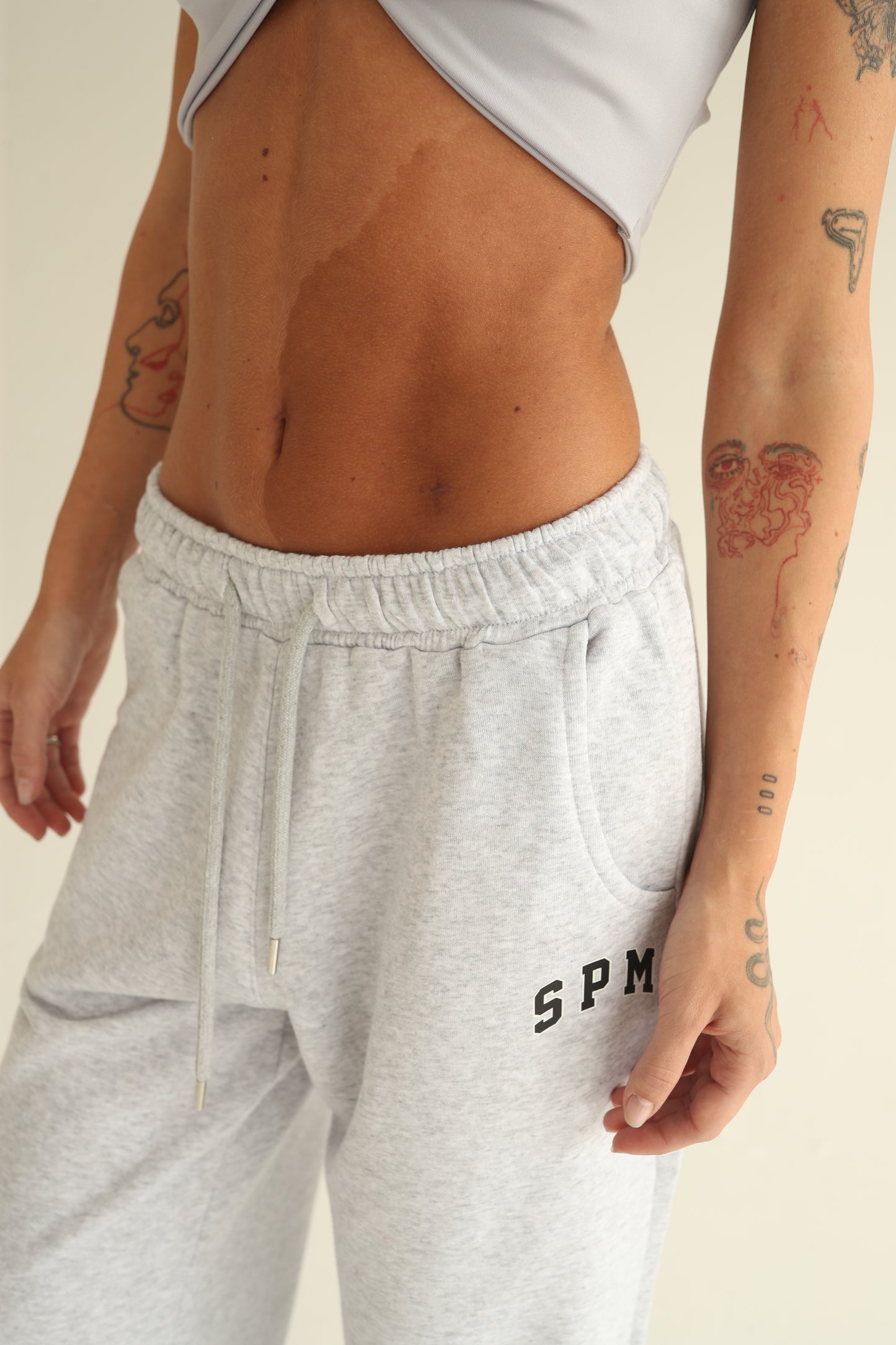 Melange gray sweatpants with rubber bottom