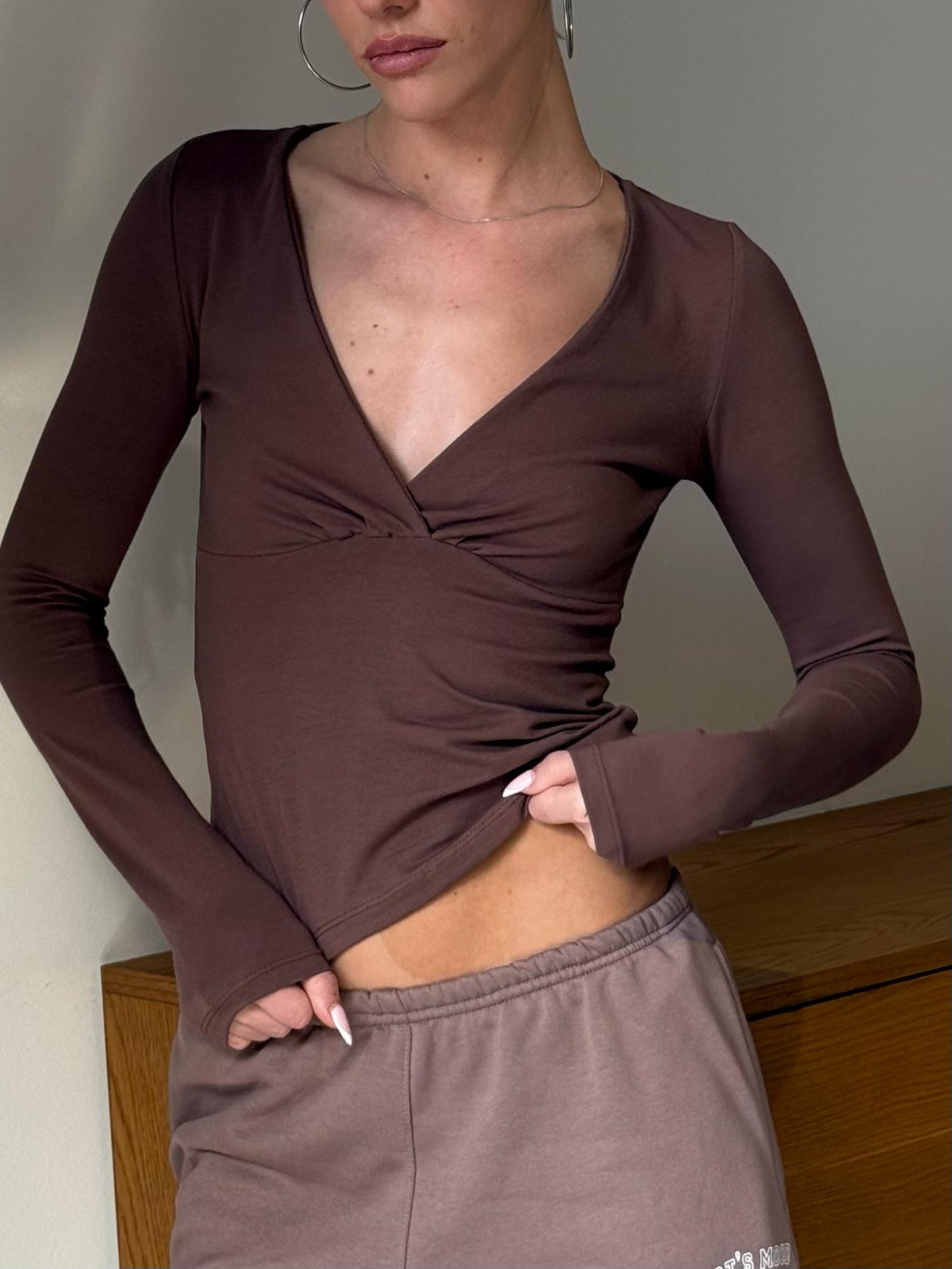 Brown V crossed top