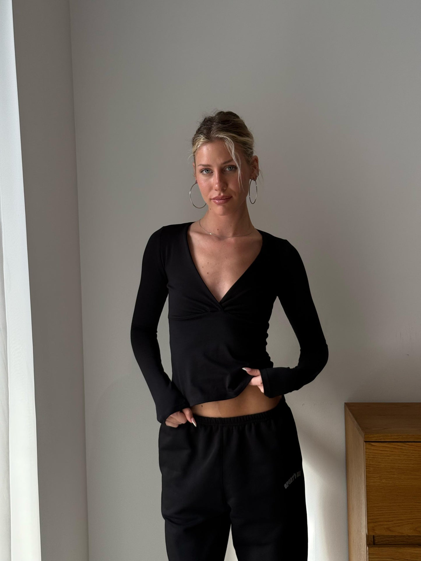 Black V crossed top