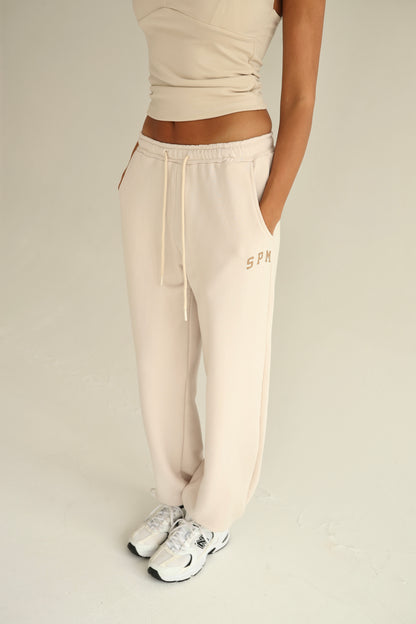 Vanilla cream sweatpants with rubber bottom