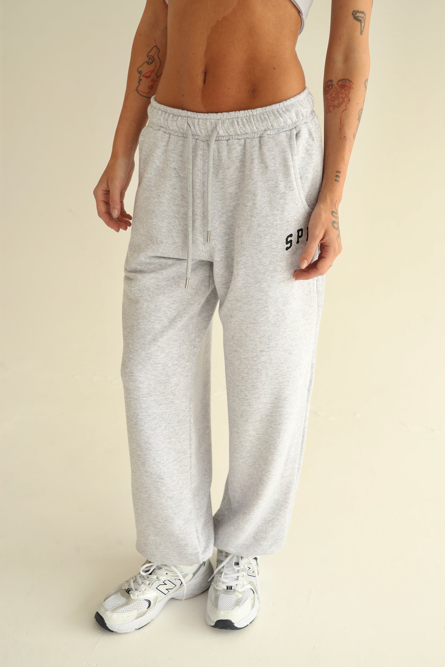 Melange gray sweatpants with rubber bottom