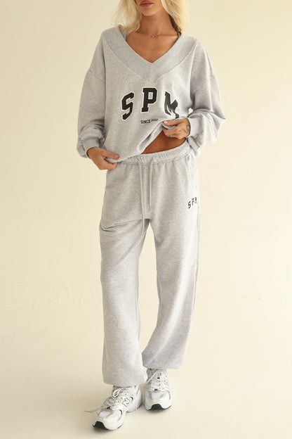 Melange gray sweatpants with rubber bottom