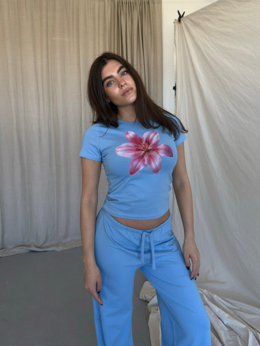 Baby blue top with pink flower