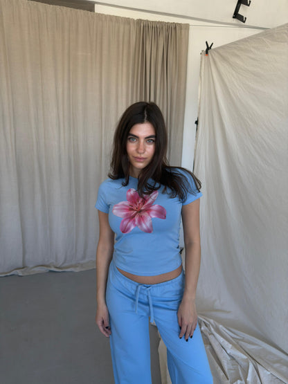 Baby blue top with pink flower