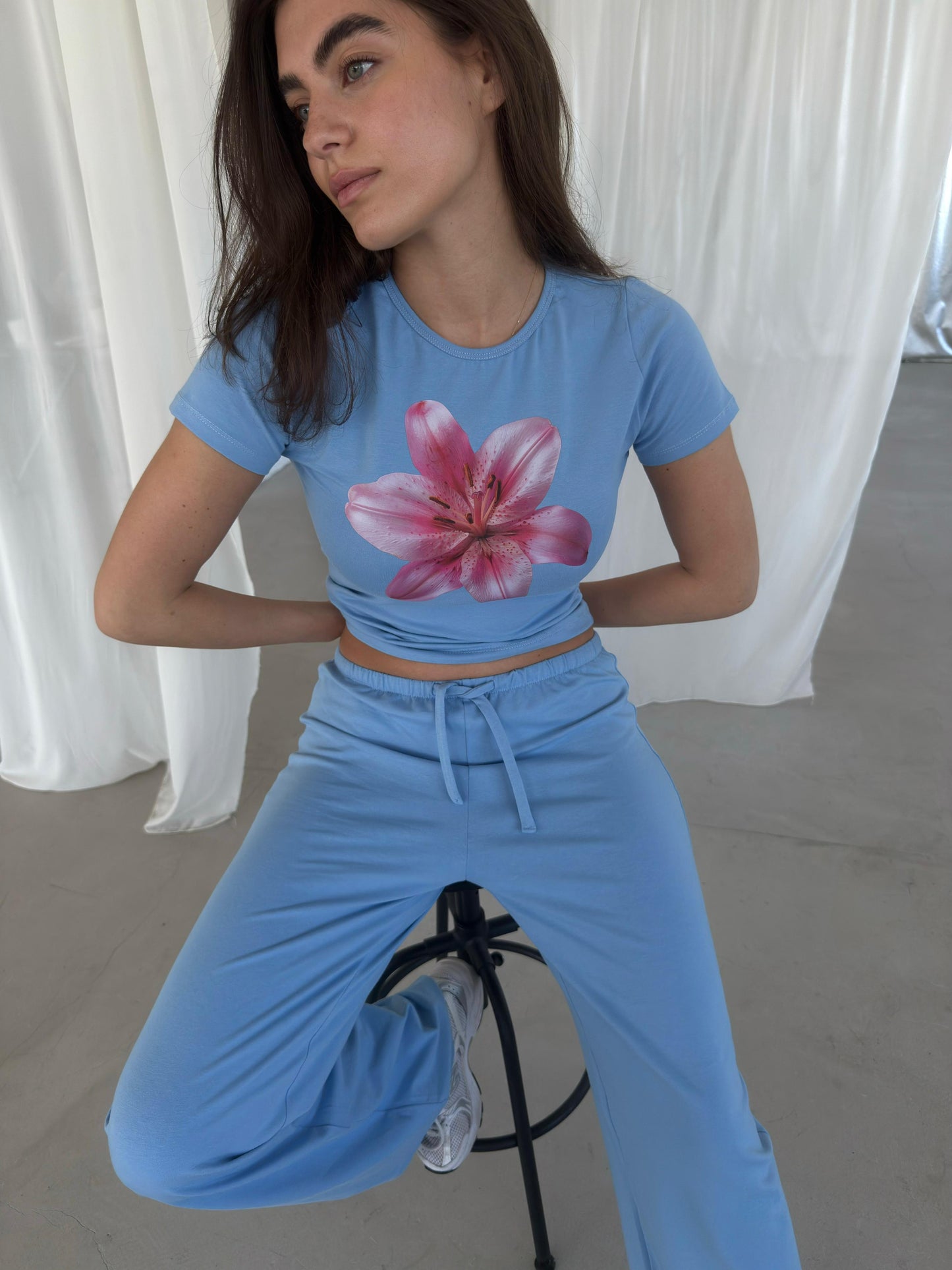 Baby blue top with pink flower
