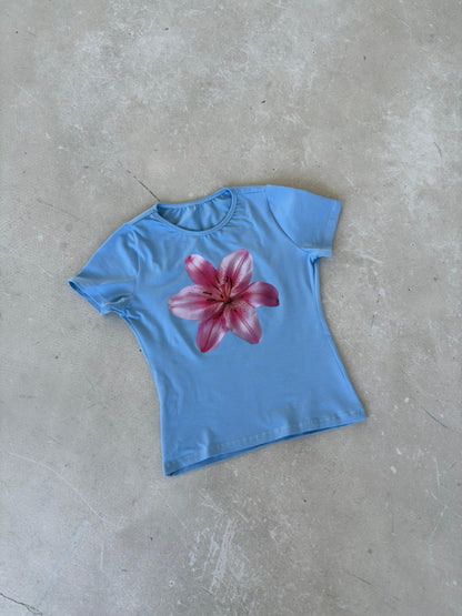 Baby blue top with pink flower